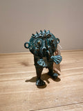 Tikar Figurine of Oxidized Bronze
