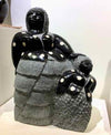 “Mother and Child” by Aron Kapembeza